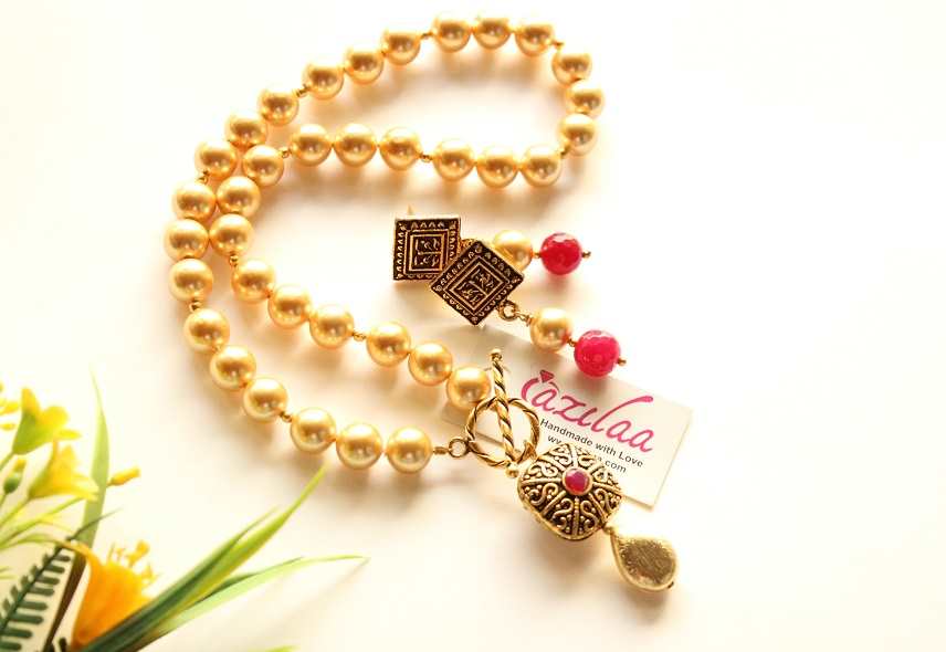 Classic golden pearl necklace earrings