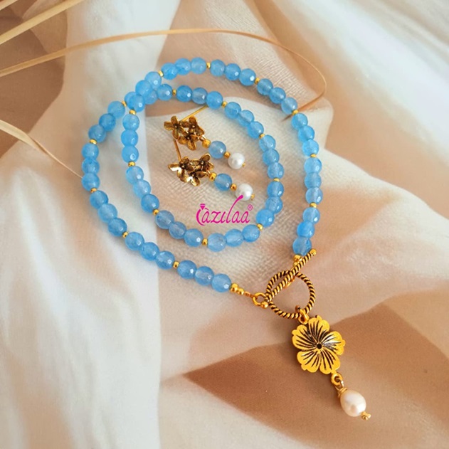 Dainty light blue beaded charm necklace earrings set