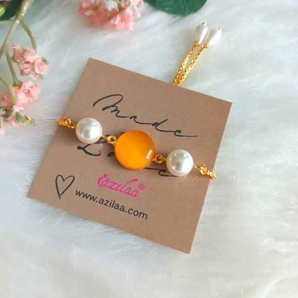 Designer orange golden chain beaded  bracelet