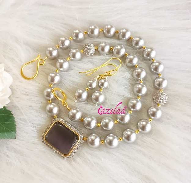 Elegant silver pearl necklace earrings
