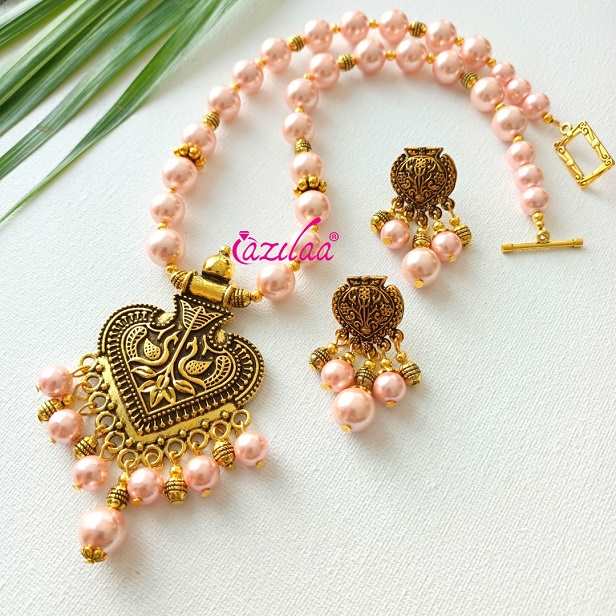 Ethnic Peach Pearl designer golden necklace earrings set