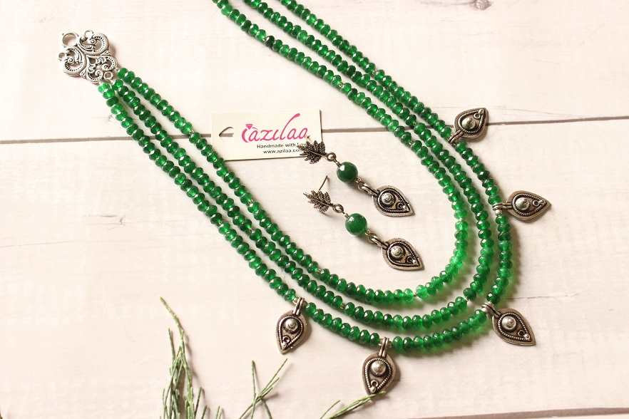 Ethnic green triple layered beaded necklace earrings set