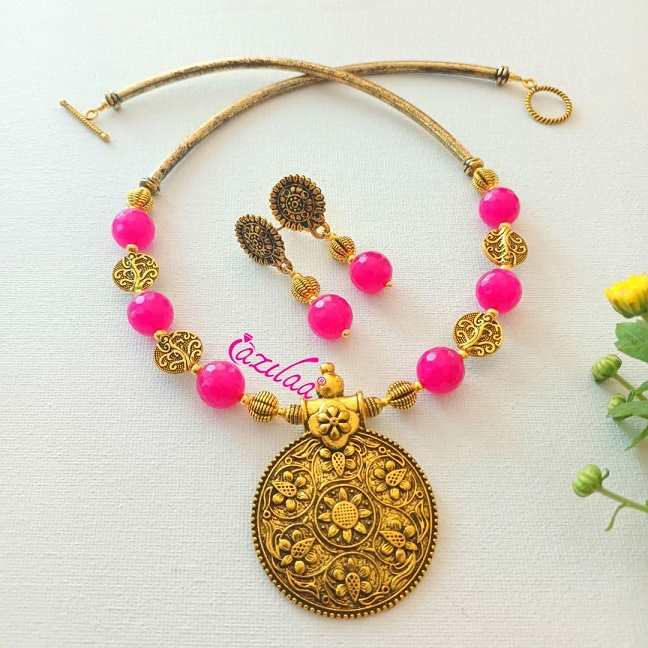 Ethnic pink designer golden necklace earrings set