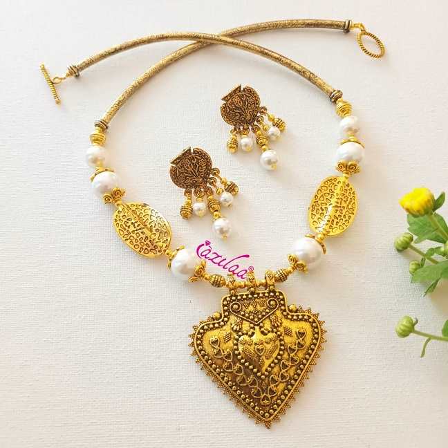 Ethnic white pearl designer golden necklace earrings set