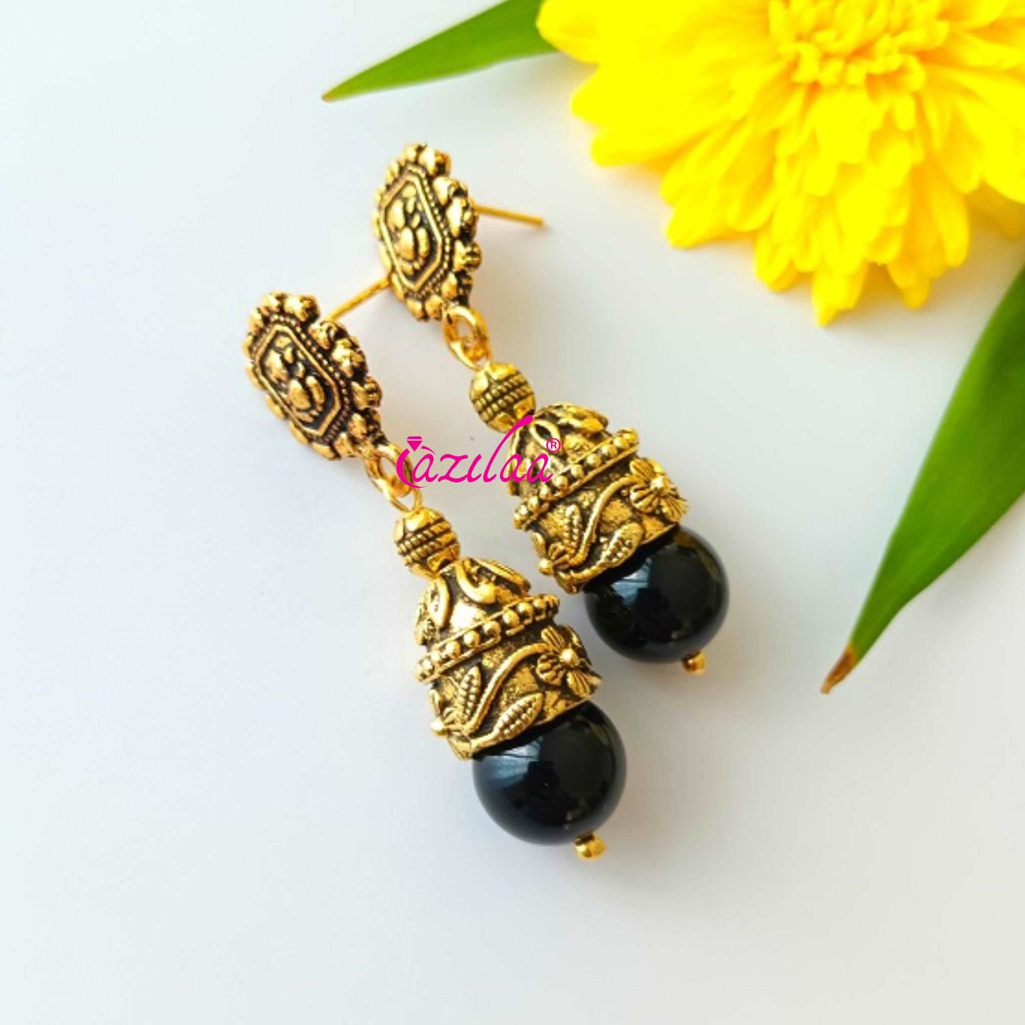 Ganesha dangler antique golden black onyx earrings