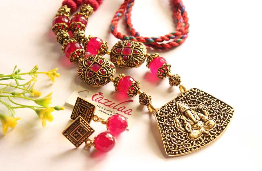 Ganesha pinkish maroon Antique gold tone  necklace earrings set