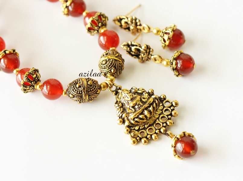 Goddess antique gold tone gemstone necklace earrings set