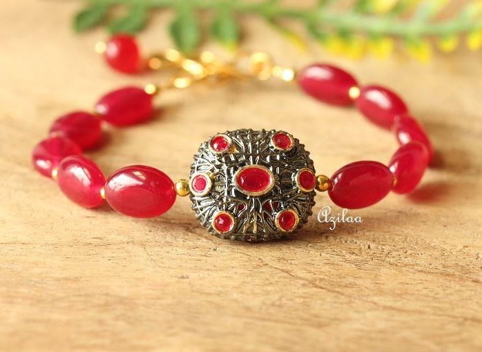 Gold plated maroon gemstone handmade bracelet