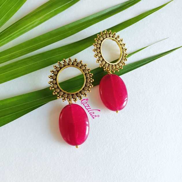 Golden oval drop gemstone dangler statement earrings