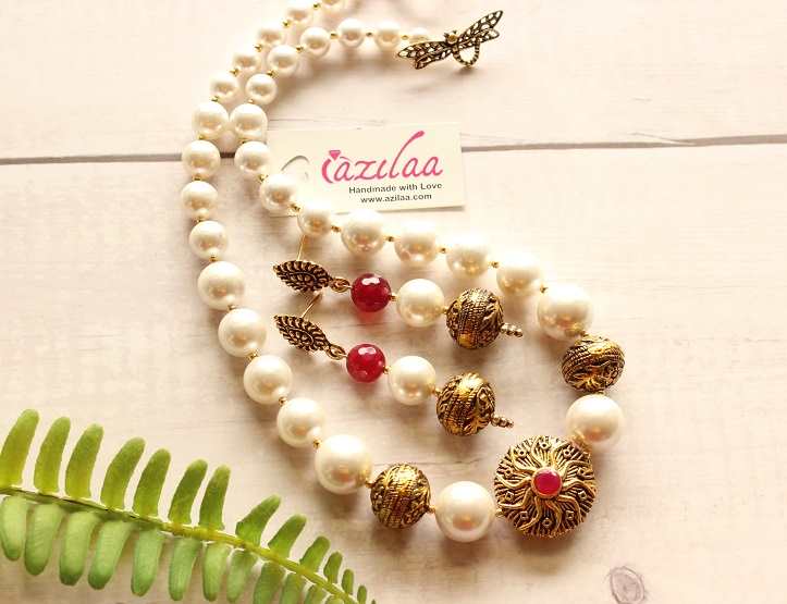 Graduated ruby red Pearl designer golden necklace earrings set