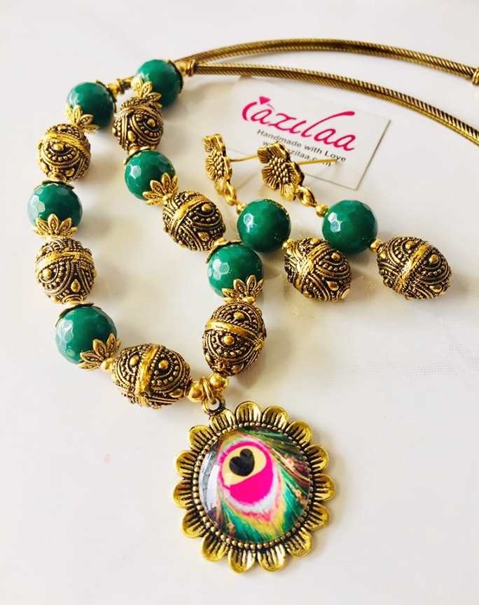 Green Peacock antique gold tone necklace earrings set