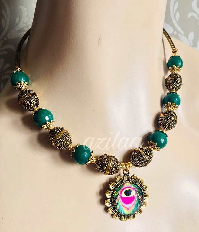 Green Peacock antique gold tone necklace earrings set