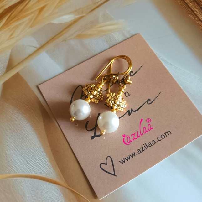 Lotus white pearl dangler charm earrings