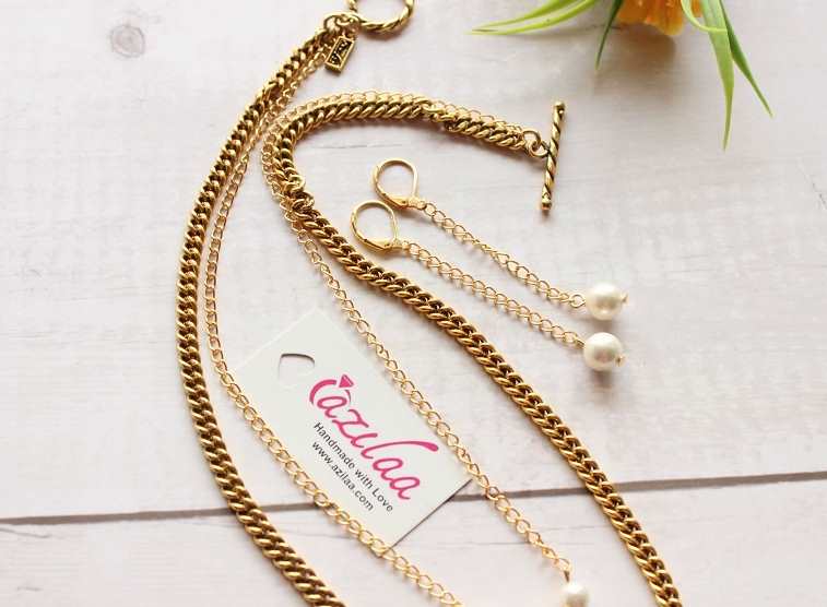 Quirky Leo pearl pendant gold plated layered chain necklace set