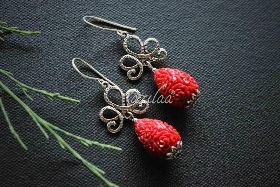 Red floral carved beaded chandelier silver earrings