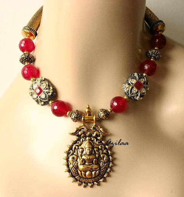 Laxmi pendant maroon beads necklace earrings set