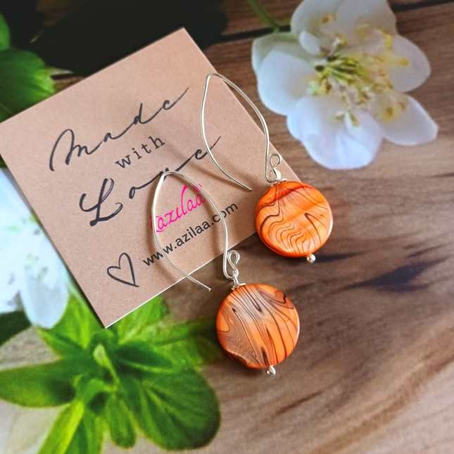 Spring orange mother of pearl disk statement fun earrings