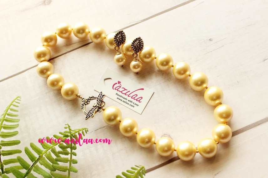 Statement Antique style golden yellow pearl necklace earrings