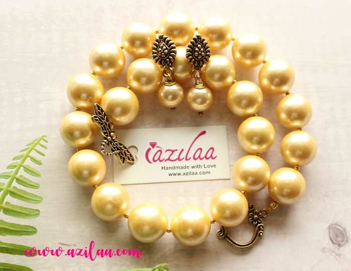 Statement Antique style golden yellow pearl necklace earrings