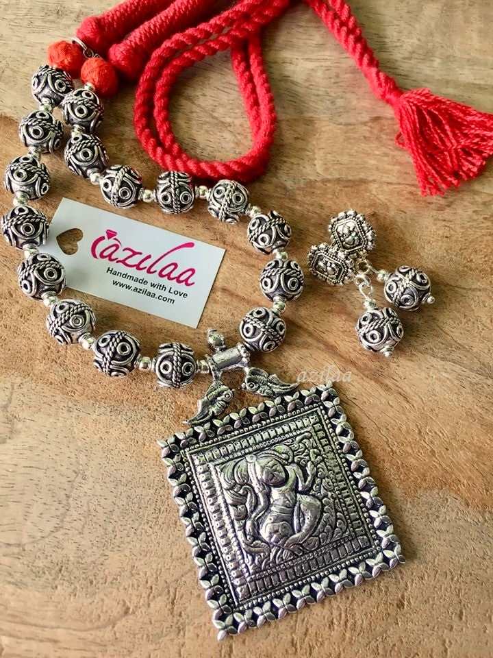 Statement ethnic silver tone pendant necklace earrings set 