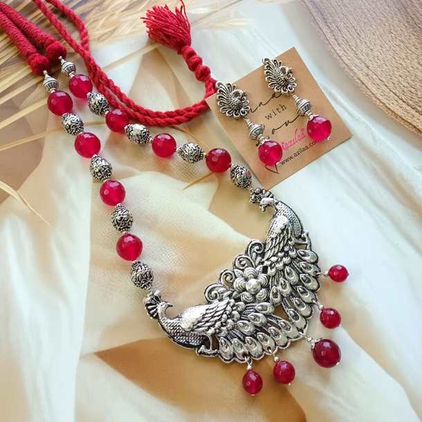 Statement peacock maroon necklace earrings set