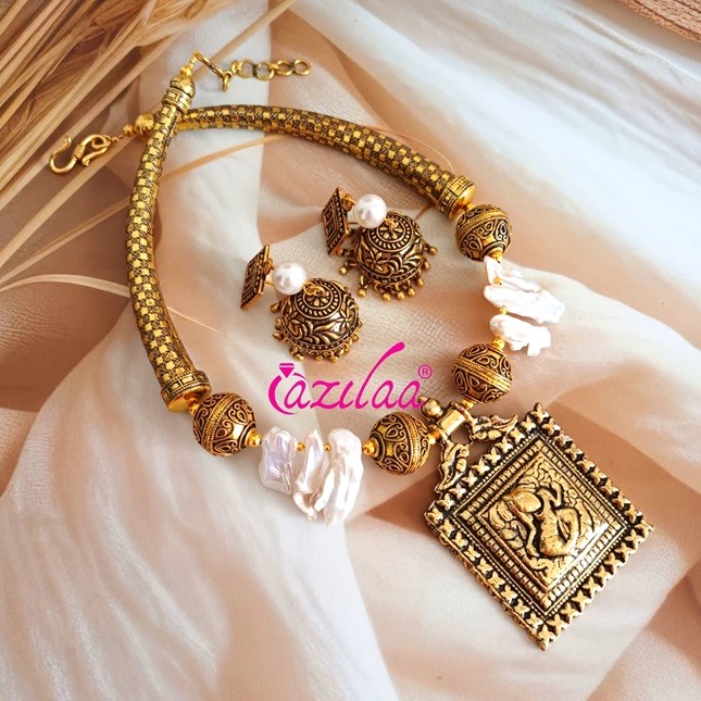 Statement pearl gemstone necklace earrings set