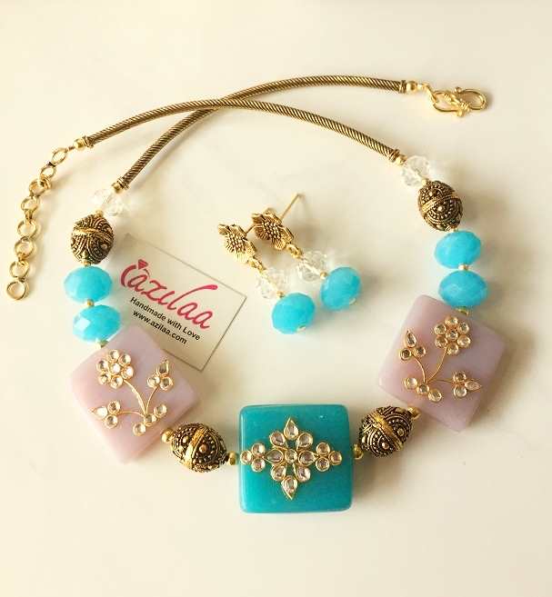 Traditional blue crystal antique gold tone necklace earrings set